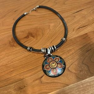 Statement necklace with a Scandinavian like flower paint design